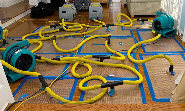 Professional Flood Damage Restoration technician working in Pontiac, IL